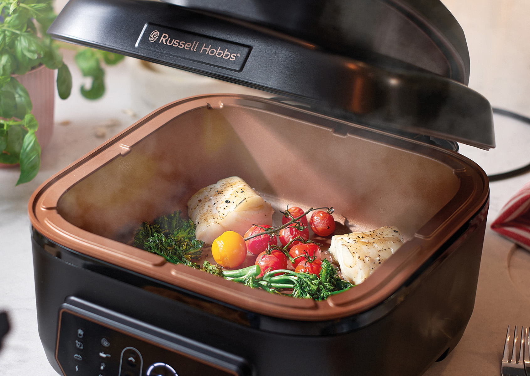 Dorsz z pomidorkami koktajlowymi i brokulem Russell Hobbs